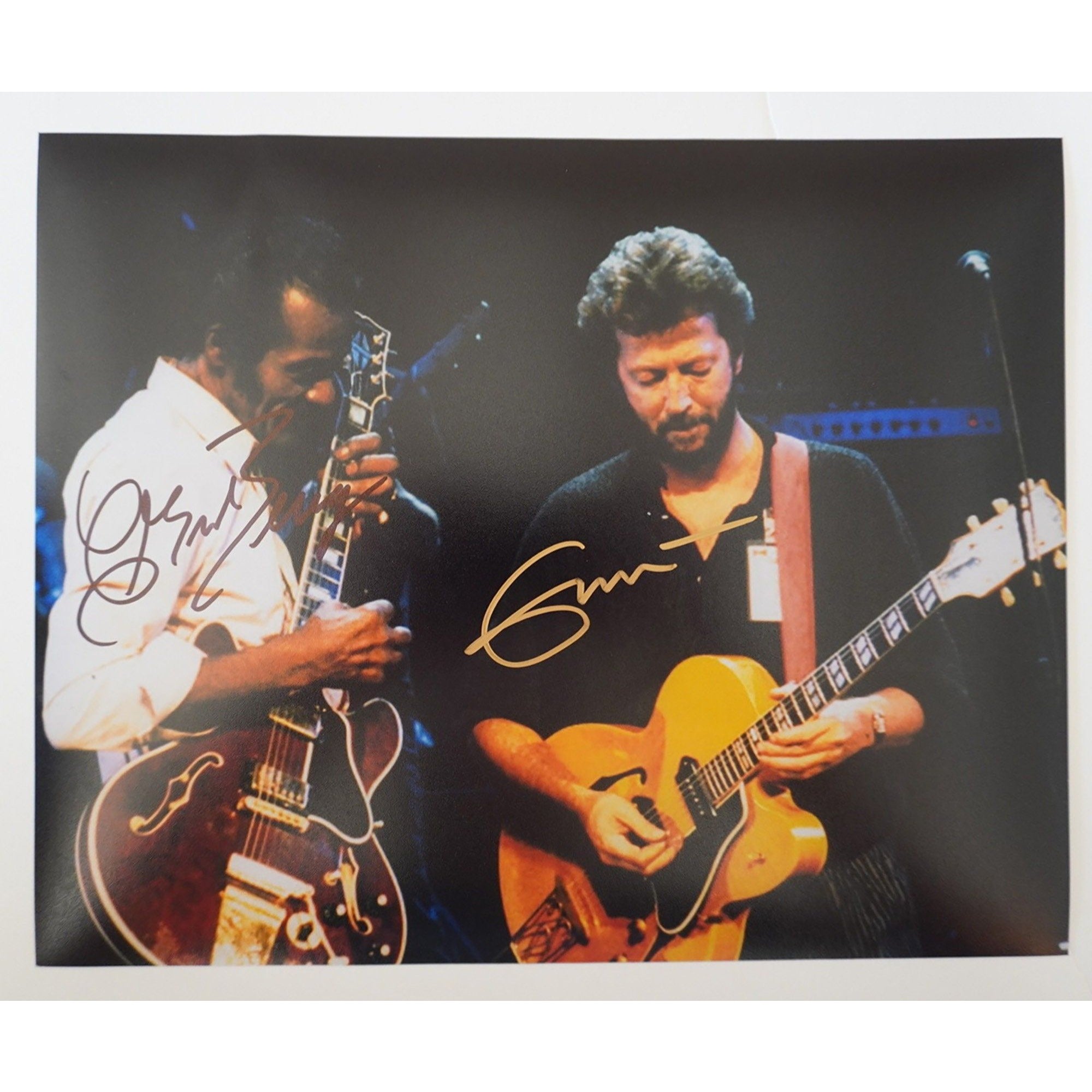 Eric Clapton and Chuck Berry 8 by 10 signed photo with proof
