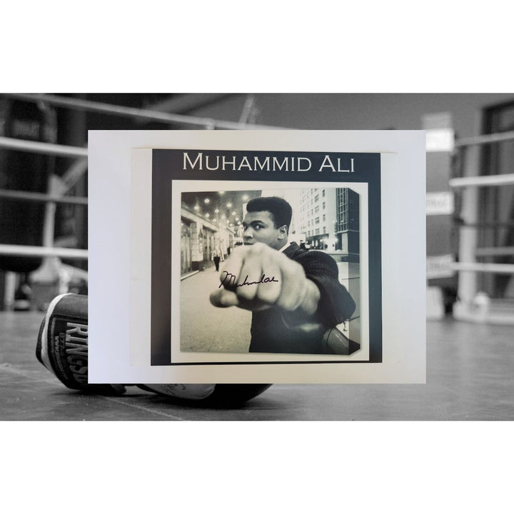 Muhammad Ali 8 x 10 photo signed with proof - Awesome Artifacts 