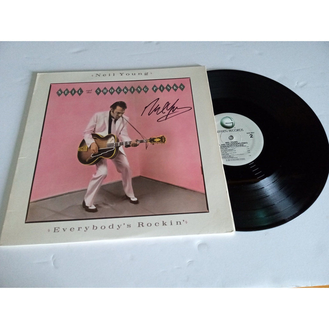 Neil Young Everybody's Rockin LP signed with proof - Awesome Artifacts 