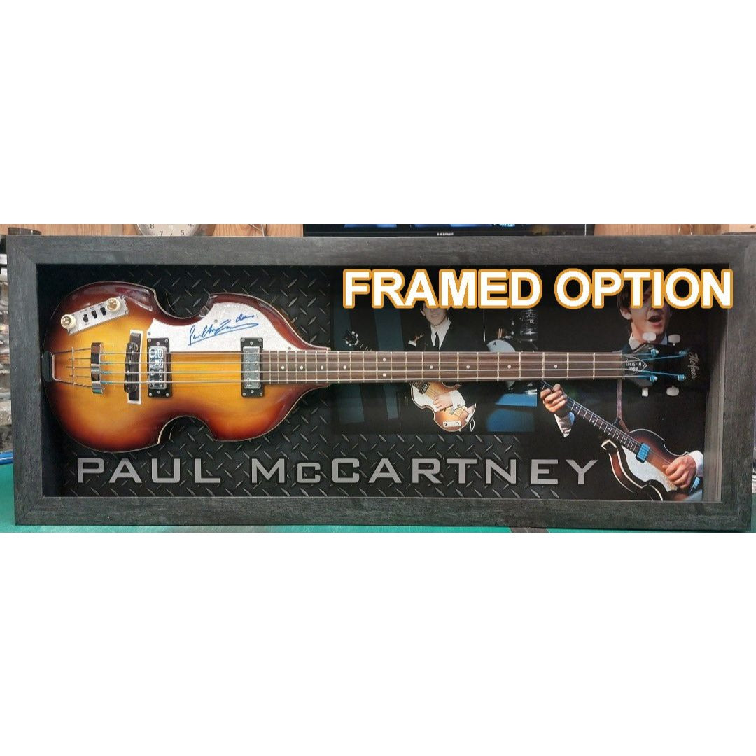 A Sgt. Pepper Hofner bass, signed by Paul McCartney, is up for auction