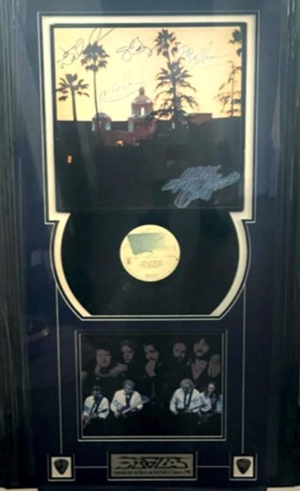 Glen Frey, Don Henley, Joe Walsh "Welcome to the Hotel California" LP signed and framed with proof