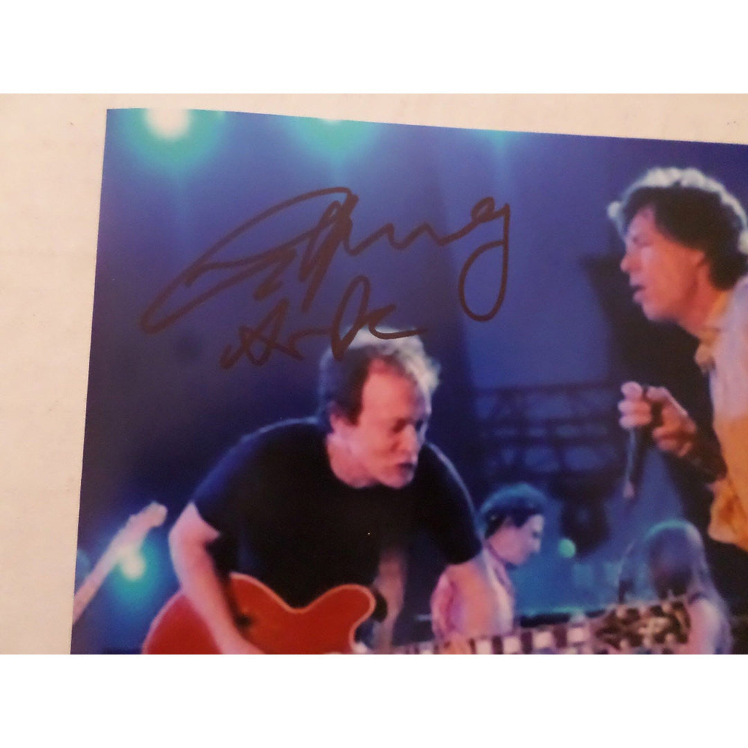 Angus Young and Mick Jagger 8 by 10 signed photo with proof