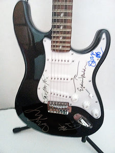 Pearl Jam Eddie Vedder, Jeff Ament, Stone Gossard, Mike McCready, Matt Cameron signed electric guitar with proof