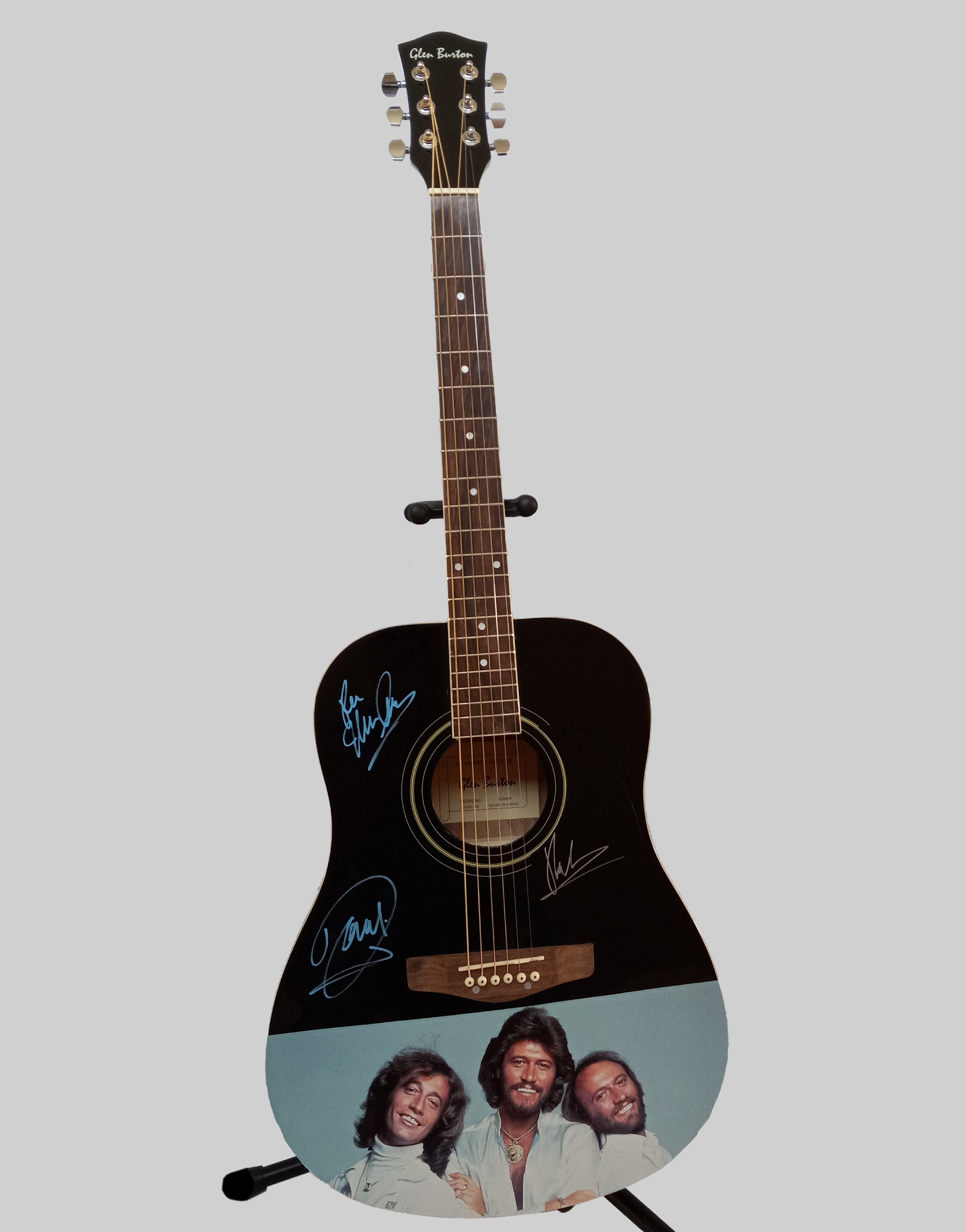 Barry, Robin and Maurice Gibb the Bee Gees one of a kind guitar signed with proof