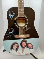Load image into Gallery viewer, Barry, Robin and Maurice Gibb the Bee Gees one of a kind guitar signed with proof
