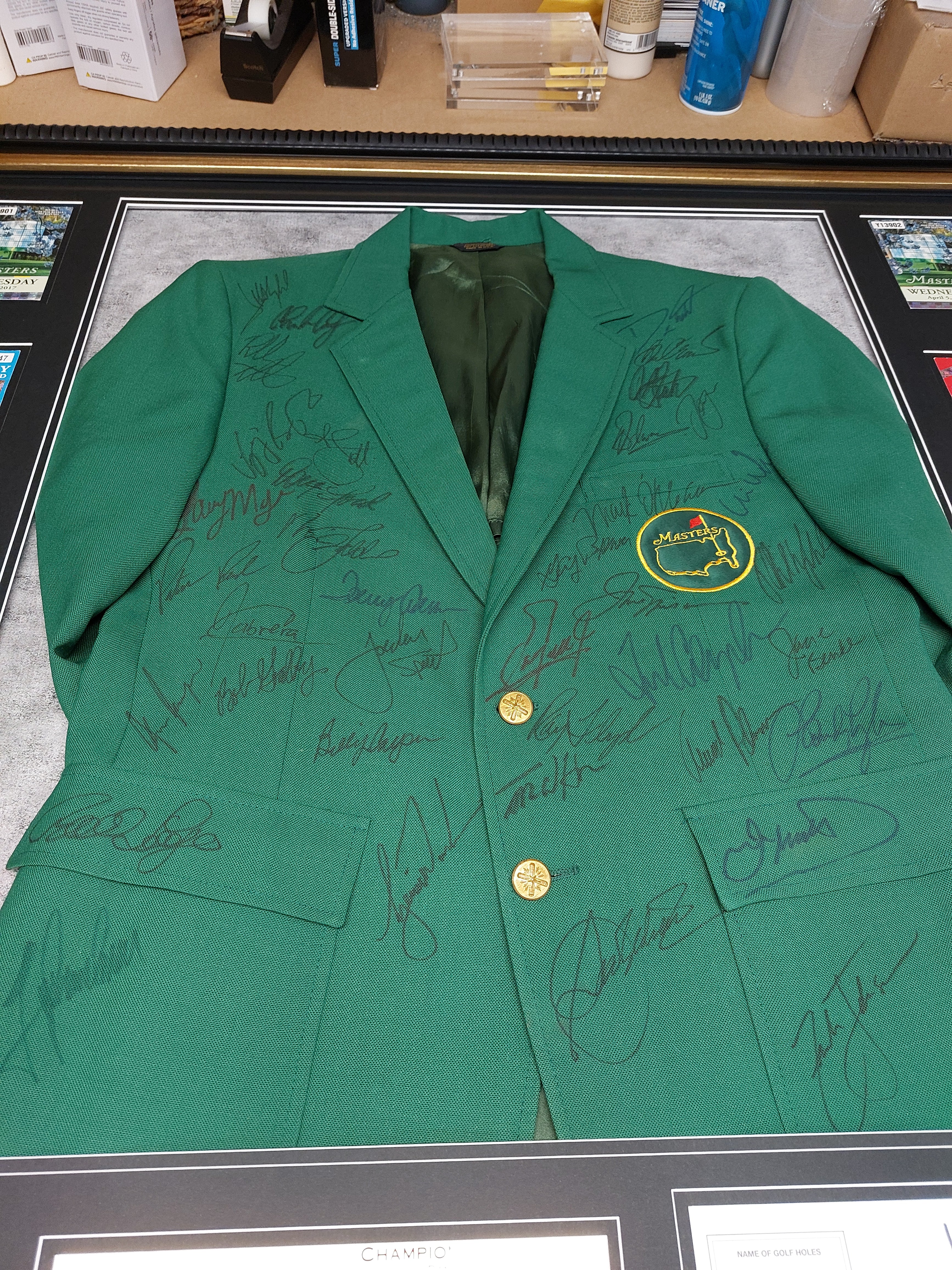 Masters Champions green jacket 40 in all Tiger Woods, Jack Nicklaus, Arnold Palmer, Sam Snead, Byron Nelson signed with proof and museum quality frame 43x43 with proof