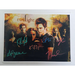 Twilight Robert Pattinson,  Kristen Stewart, Taylor Lautner, Ashley Greene, Kellan Lutz, Nikki Reed 8 by 10 signed photo with proof