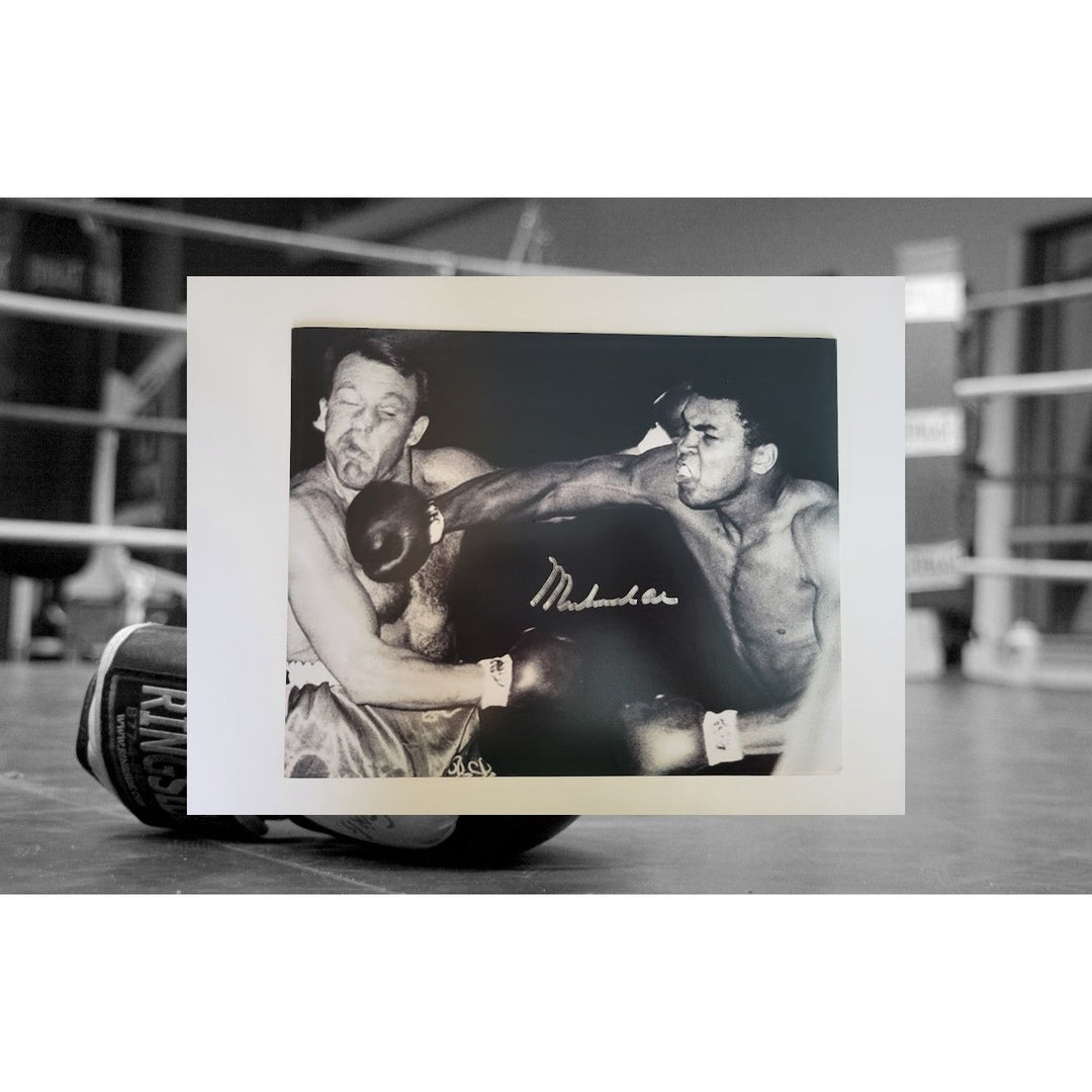 Muhammad Ali 8 x 10 photo signed with proof - Awesome Artifacts 