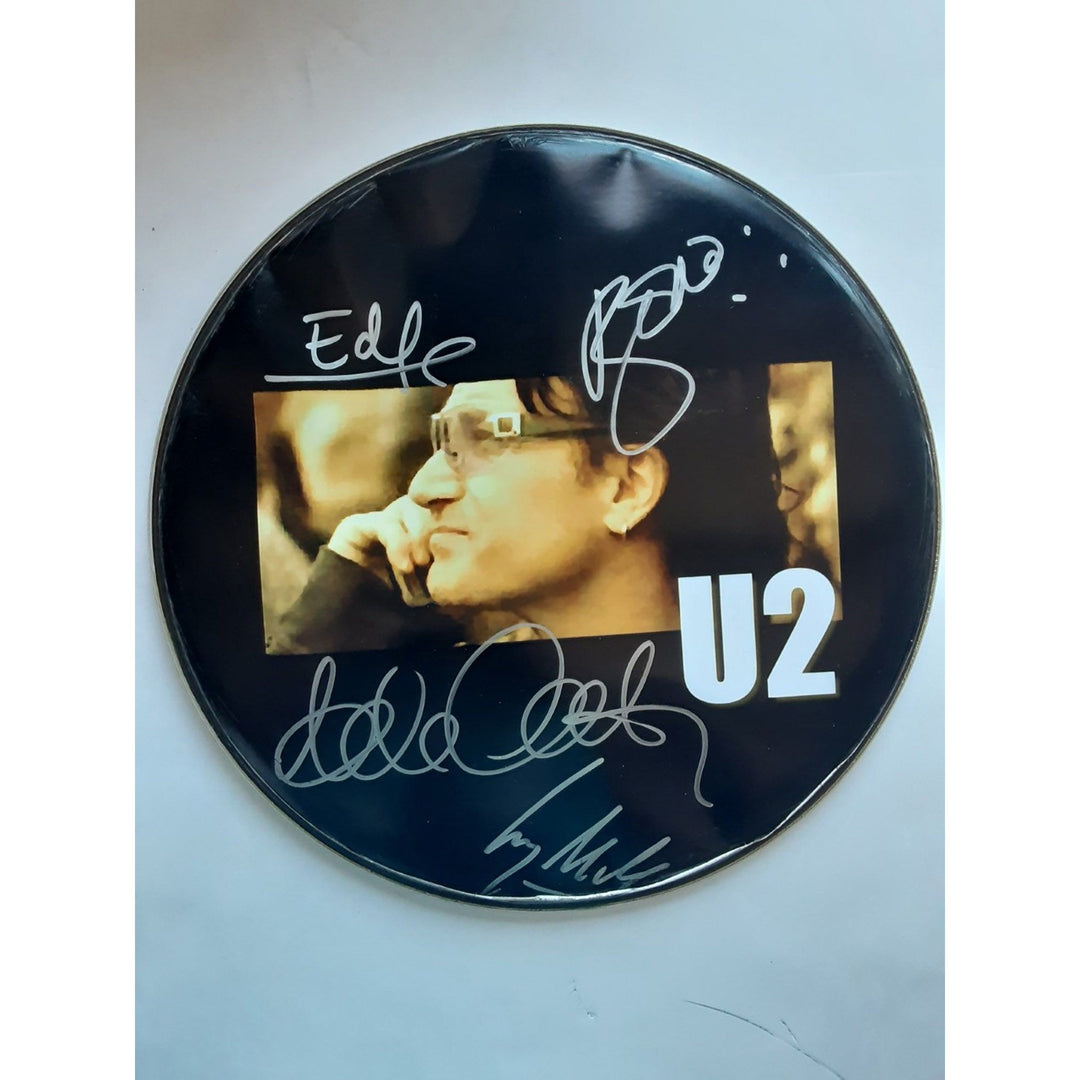 U2, Paul "Bono" Hewson,  The Edge, Adam Clayton and Larry Mullen signed 14 in drum head with proof - Awesome Artifacts 