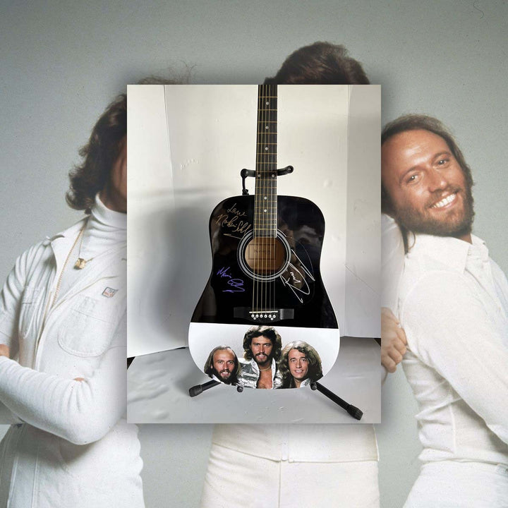 Barry, Robin and Maurice Gibb the Bee Gees Huntington 39' acoustic guitar signed with proof