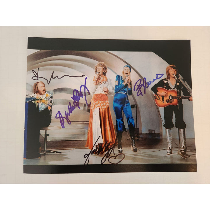 ABBA Anni-Frid Lyngstad Benny Anderson Bjorn Ulvaeus Agnetha Fältskog Zenni 8x10 photograph signed with proof