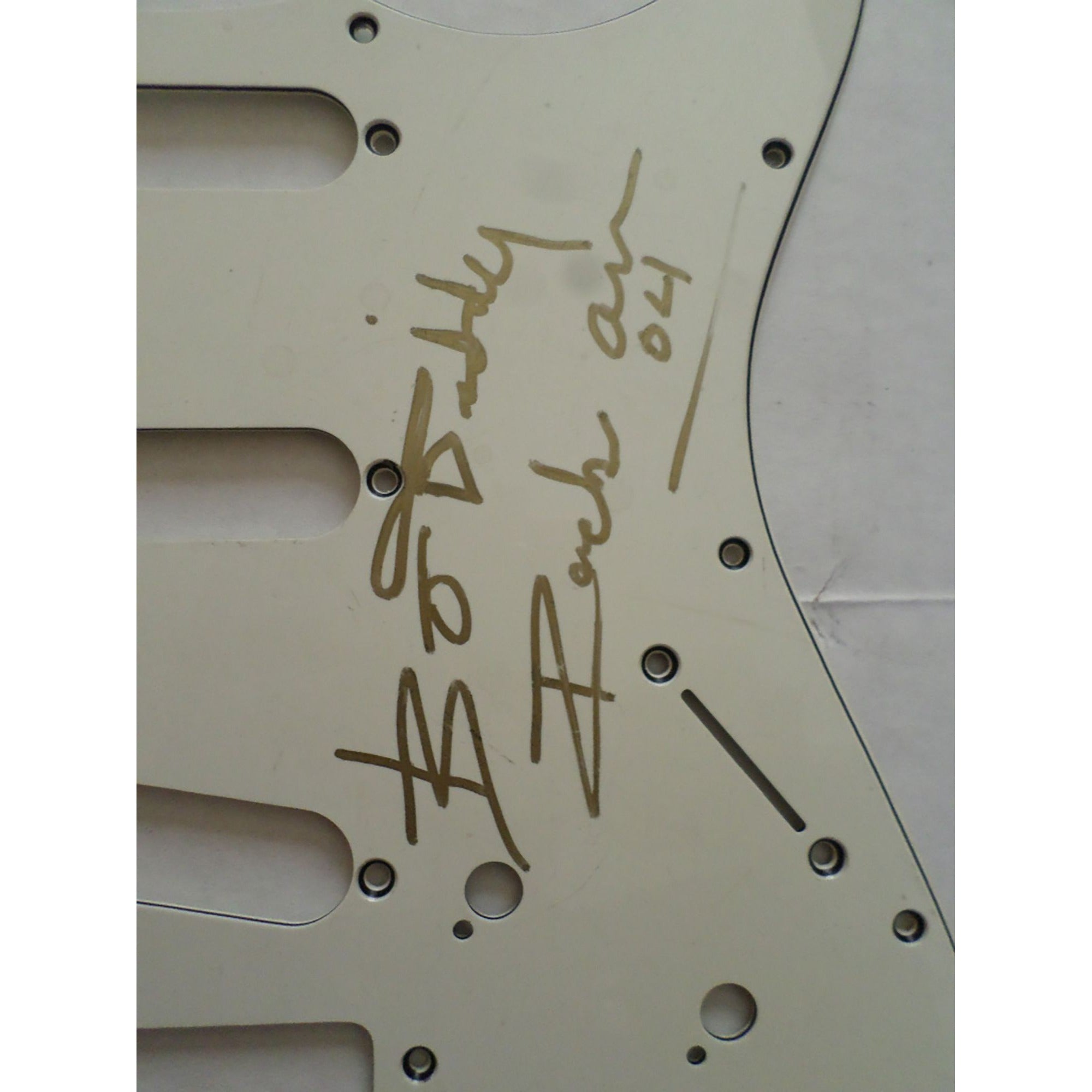 Bo Diddley signed pickguard with proof