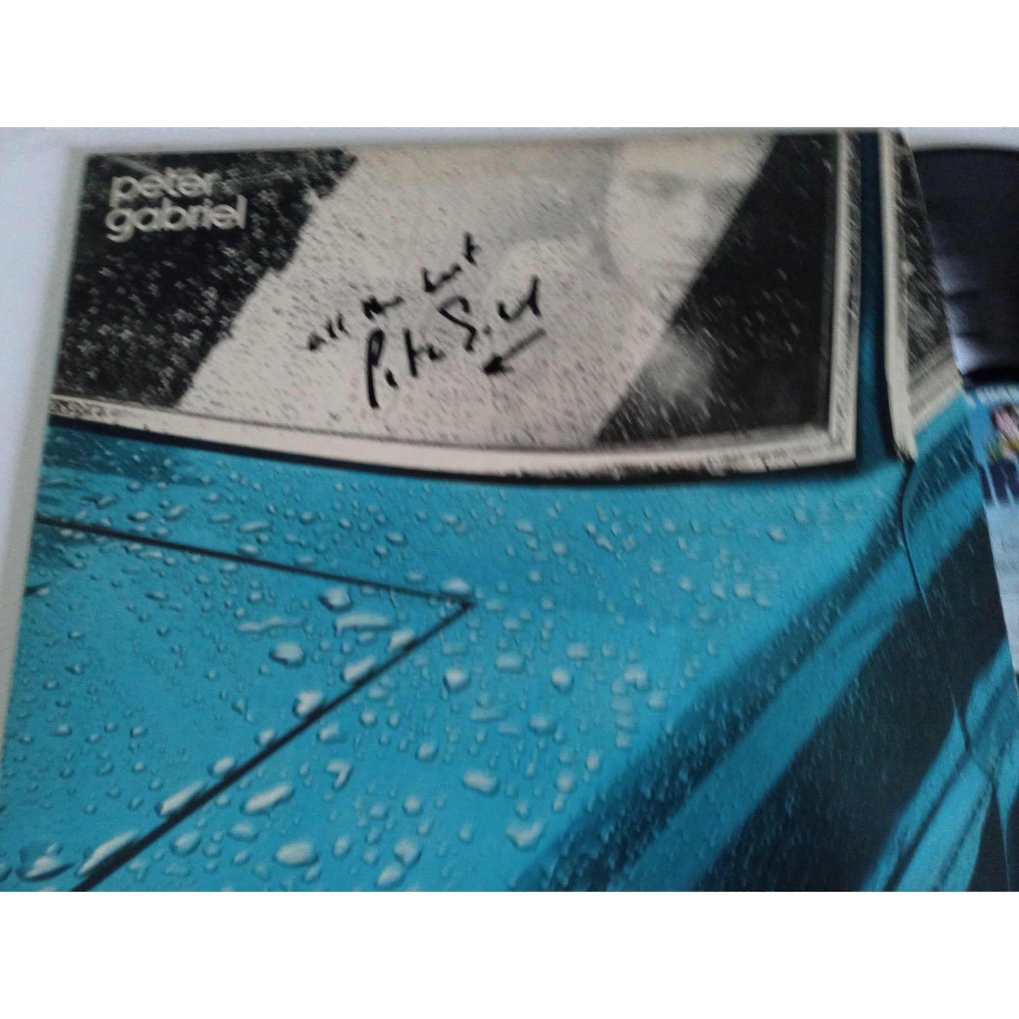 Peter Gabriel LP signed with proof - Awesome Artifacts 