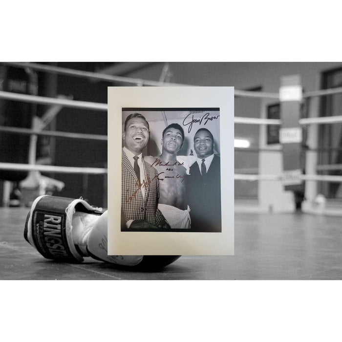 Muhammad Ali AKA Cassius Clay Sugar Ray Robinson and Jim Brown 8 x 10 photo signed with proof