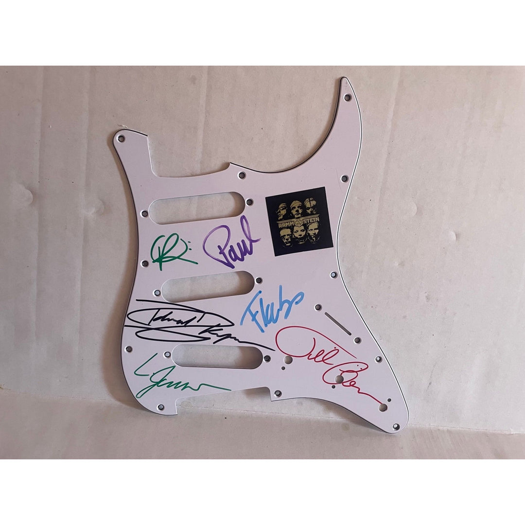 Rammstein electric guitar pickguard signed with proof - Awesome Artifacts 