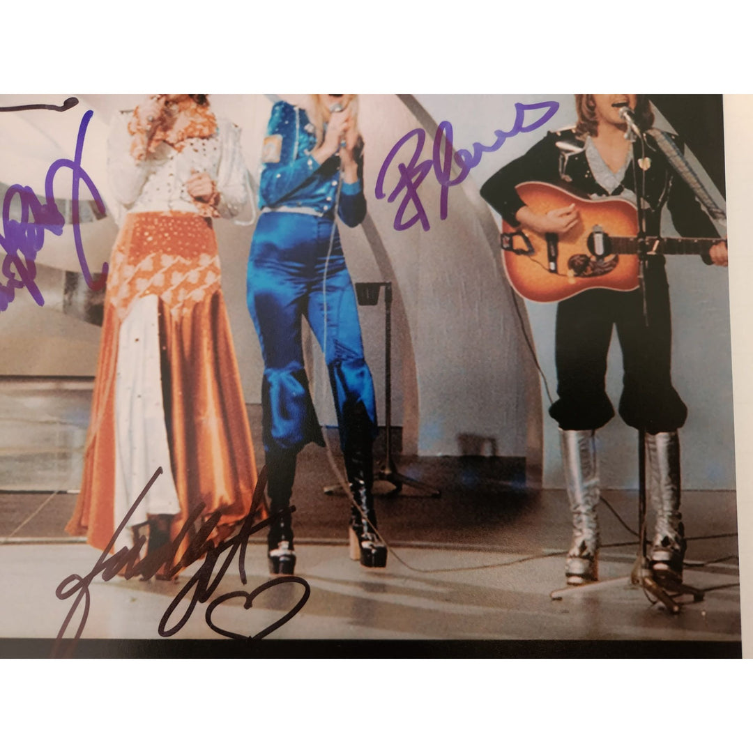 ABBA Anni-Frid Lyngstad Benny Anderson Bjorn Ulvaeus Agnetha Fältskog Zenni 8x10 photograph signed with proof