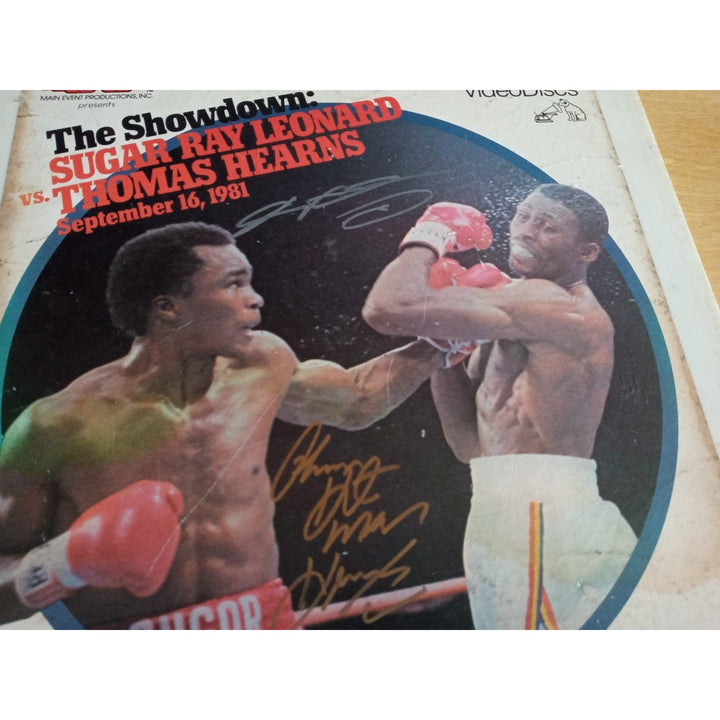 Sugar Ray Leonard and Thomas Hearns RCA video disc signed with proof - Awesome Artifacts 