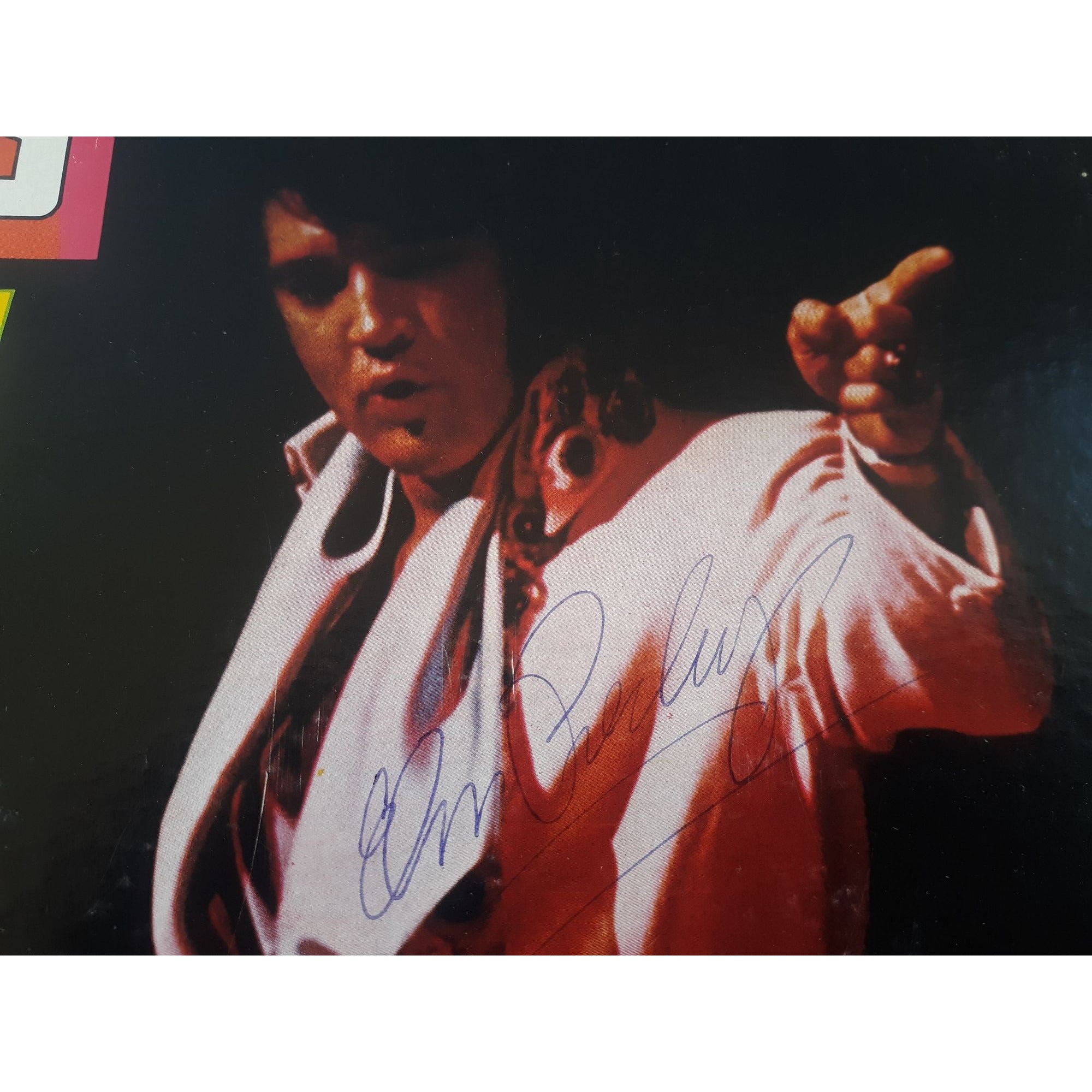 Elvis Presley "Now" LP and vinyl signed with proof