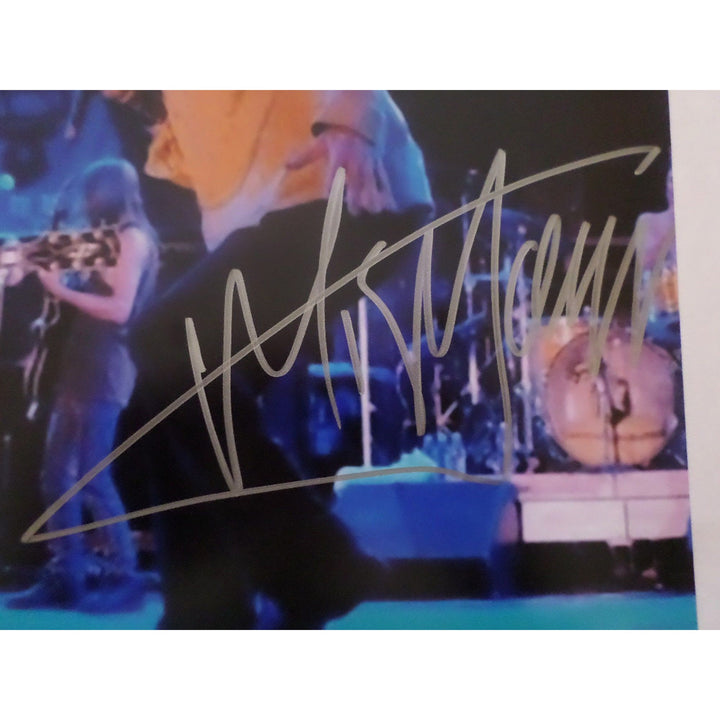 Angus Young and Mick Jagger 8 by 10 signed photo with proof