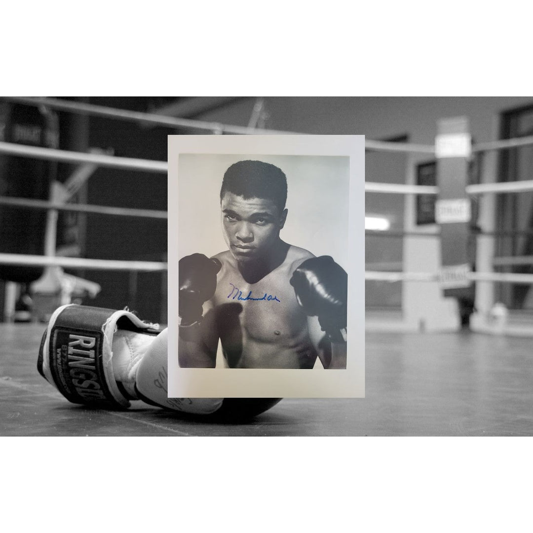 Muhammad Ali 8 x 10 photo signed with proof - Awesome Artifacts 