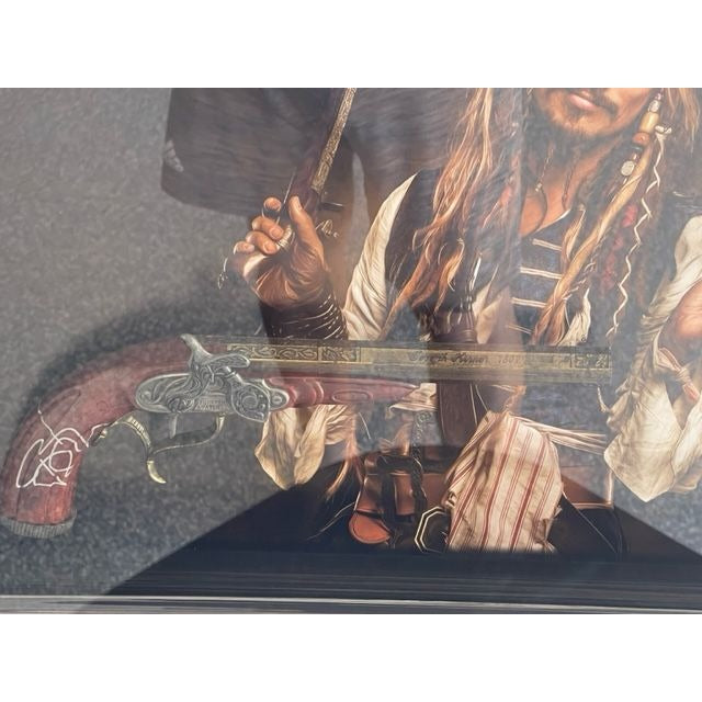 Johnny Depp Pirates of the Caribbean Jack Sparrow original flintlock Pirate pistol signed and framed (27x19x3.5) with proof