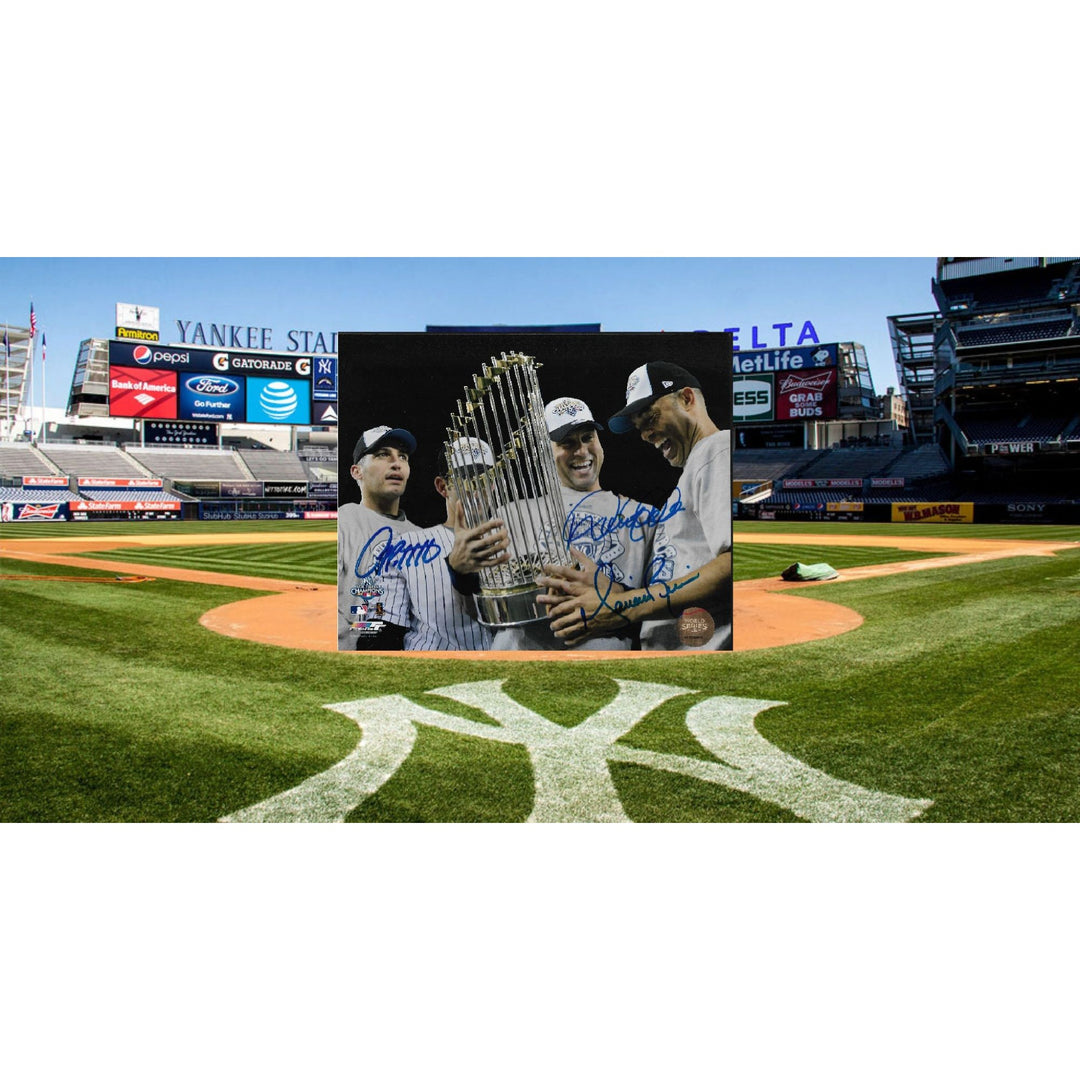 Derek Jeter Mariano Rivera and Andy pettitte. 8 by 10 signed photo