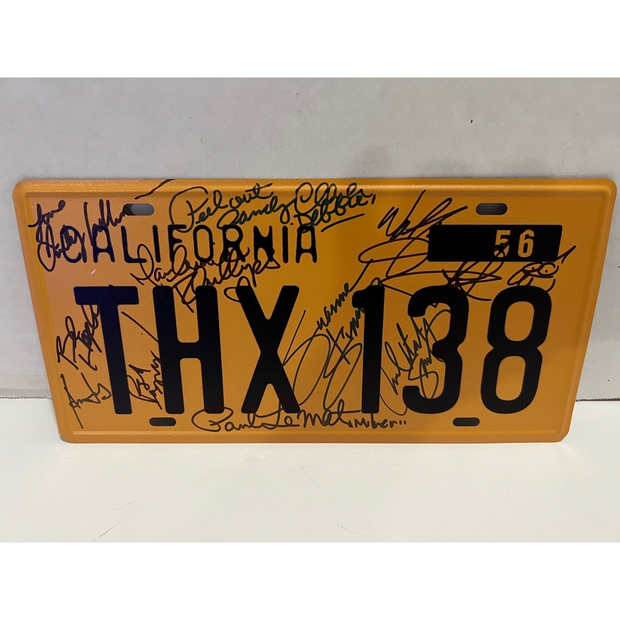 American Graffiti  original licence plate Hand-signed by: Bo Hopkins, Cindy Williams, Candy Clark, Harrison Ford and more