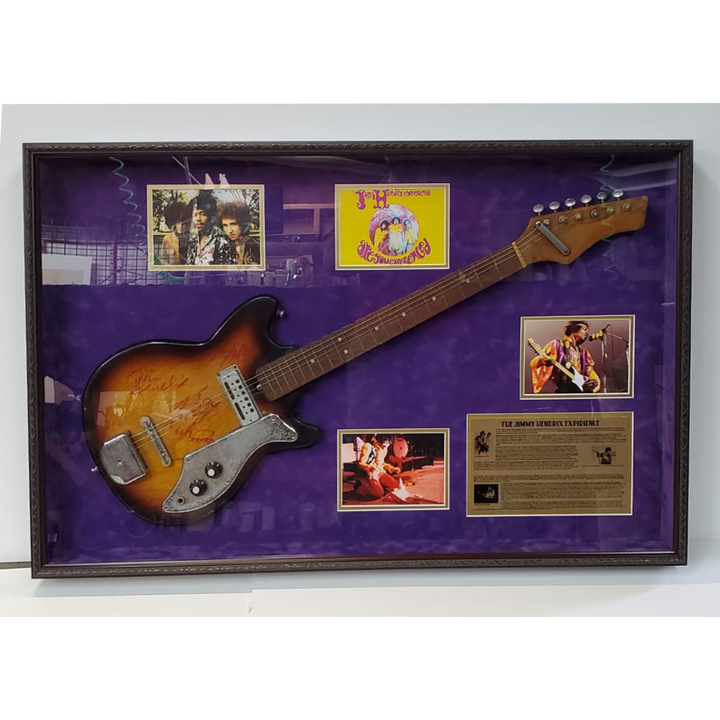 Jimi Hendrix, Mitch Mitchell, and Noel Redding The Experience signed and framed guitar