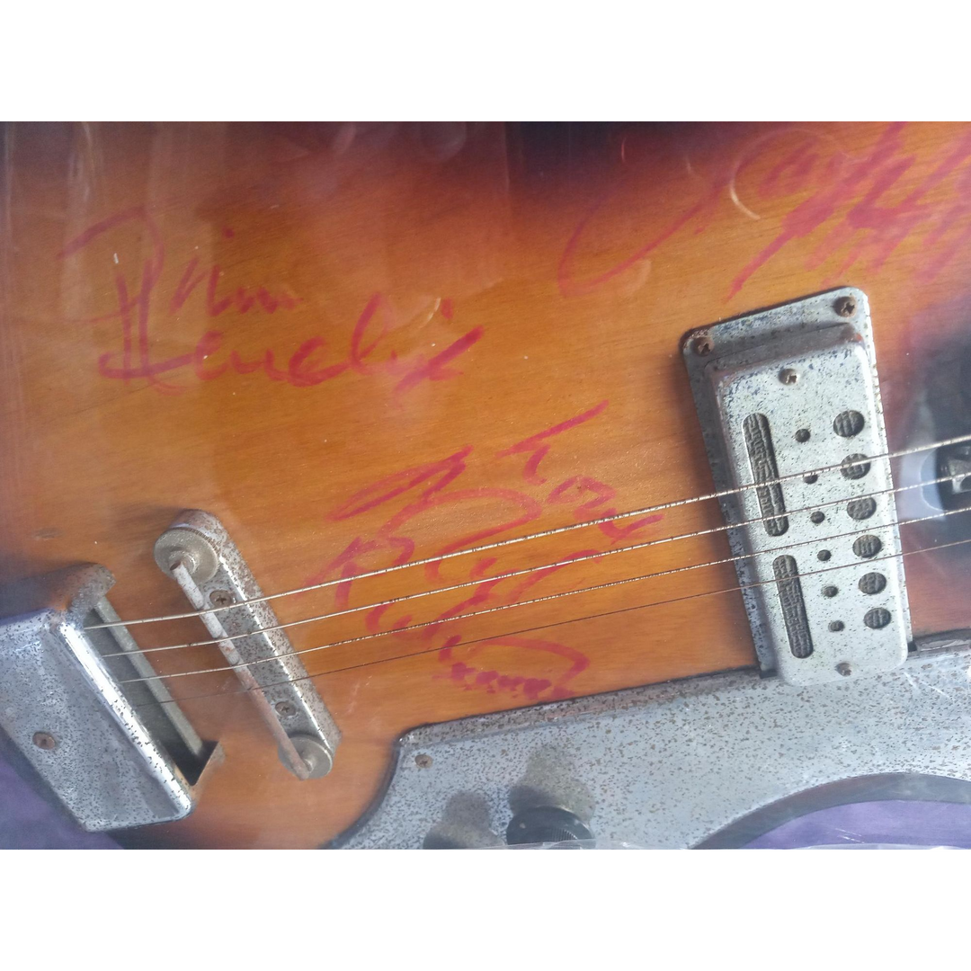 Jimi Hendrix, Mitch Mitchell, and Noel Redding The Experience signed and framed guitar