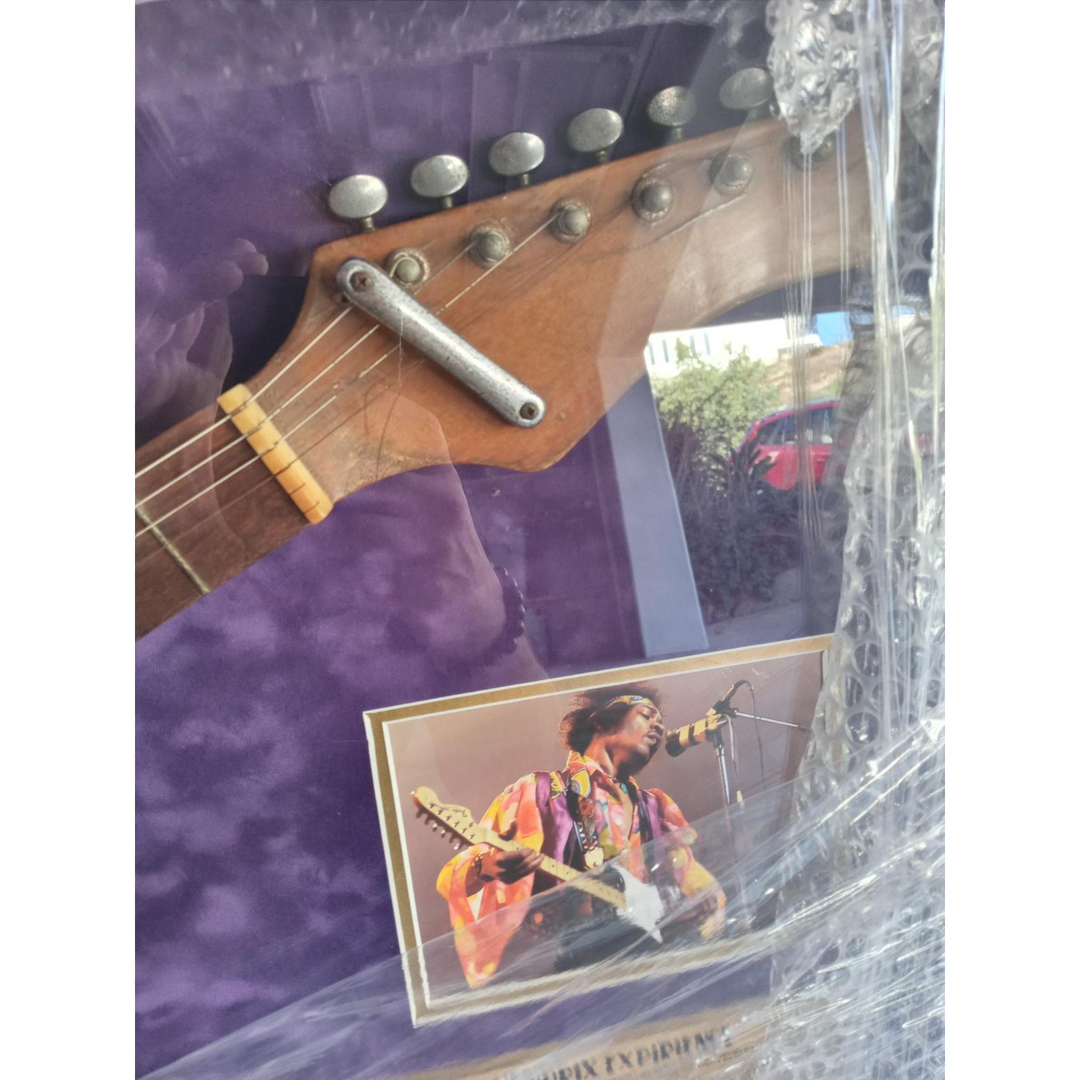 Jimi Hendrix, Mitch Mitchell, and Noel Redding The Experience signed and framed guitar