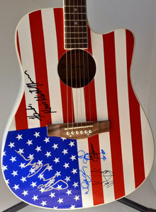 Highwaymen Johnny Cash, Waylon Jennings, Kris Kristofferson and Willie Nelson signed one of a kind guitar