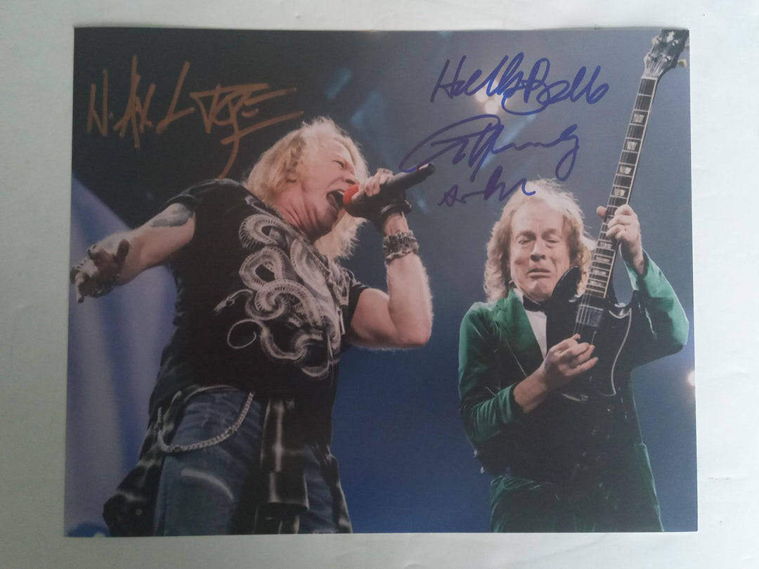 W. Axl Rose and Angus Young 8 x 10 photo signed with proof - Awesome Artifacts 