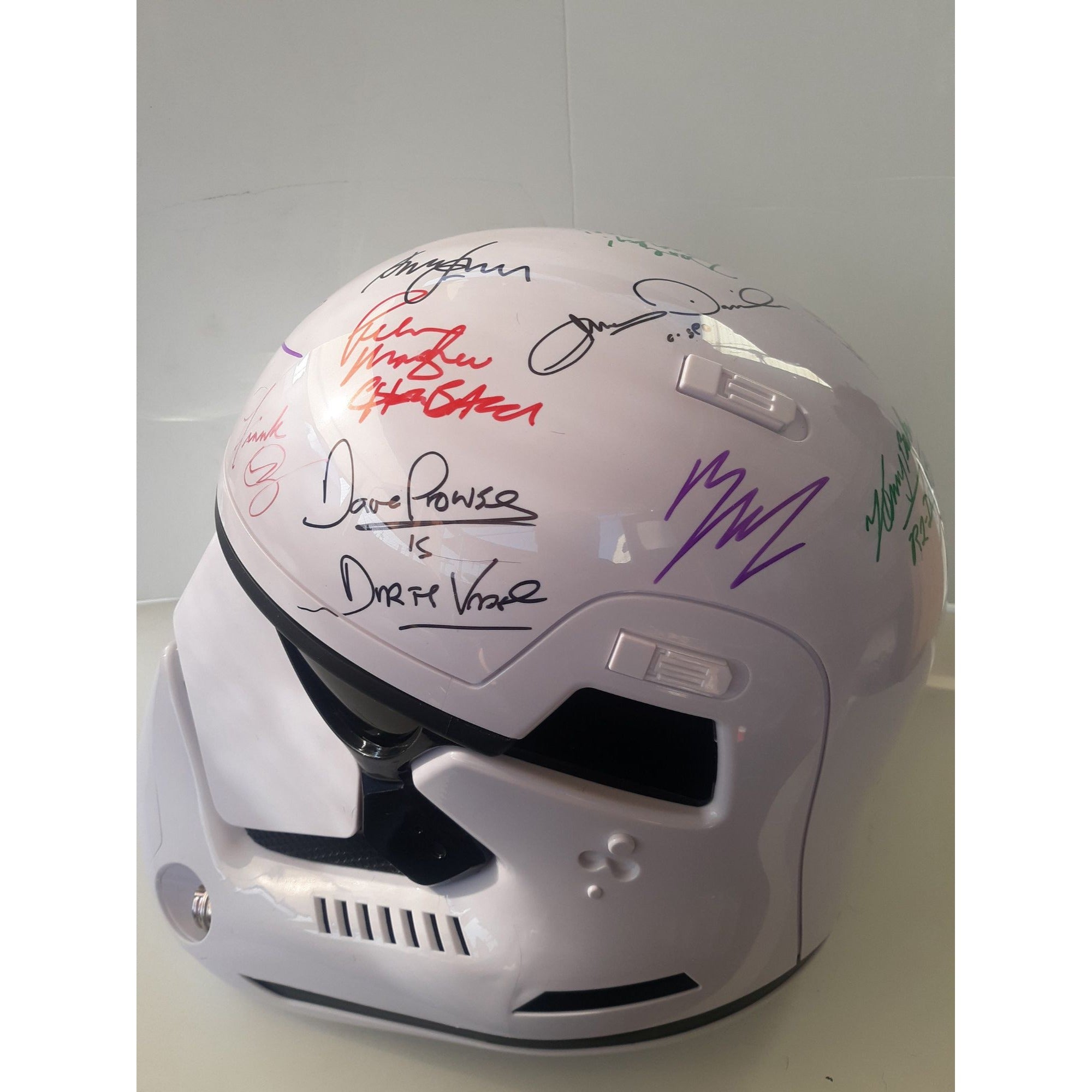Harrison Ford, James Earl Jones, Carrie Fisher, Mark Hamill, Star Wars cast signed stormtrooper helmet signed with proof