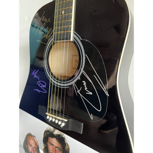 Barry, Robin and Maurice Gibb the Bee Gees Huntington 39' acoustic guitar signed with proof