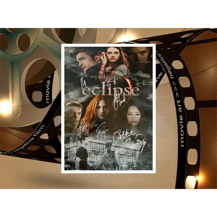 Twilight Kristen Stewart Robert Pattinson Taylor Lautner signed with proof 15x11 photo - Awesome Artifacts 