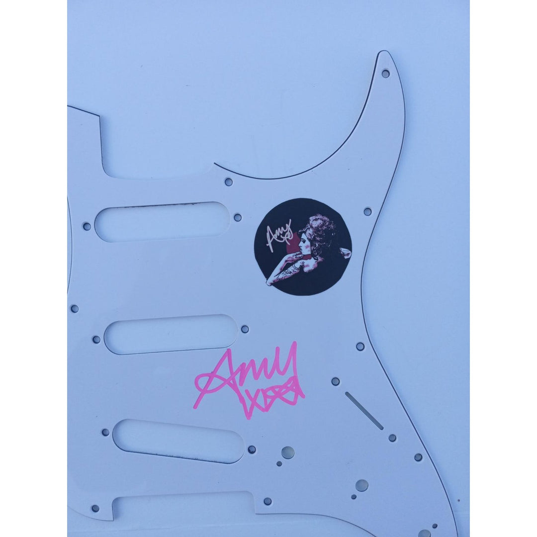 Amy Winehouse electric guitar pickguard signed with proof