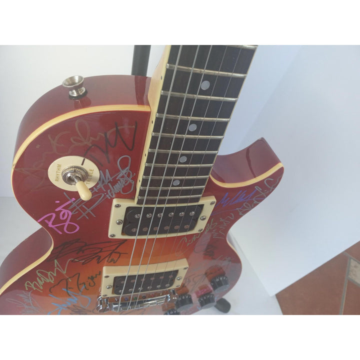 Gibson Maestro Les Paul electric guitar signed by the 30 greatest guitarists of all time Jimmy Page, Eric Clapton, Pete Townshend with proof