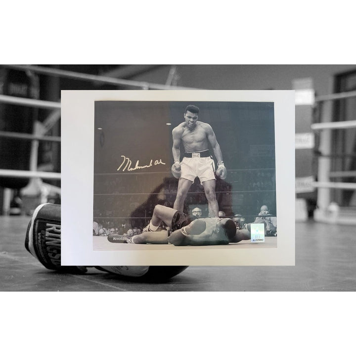 Muhammad Ali 8 x 10 photo signed with proof - Awesome Artifacts 