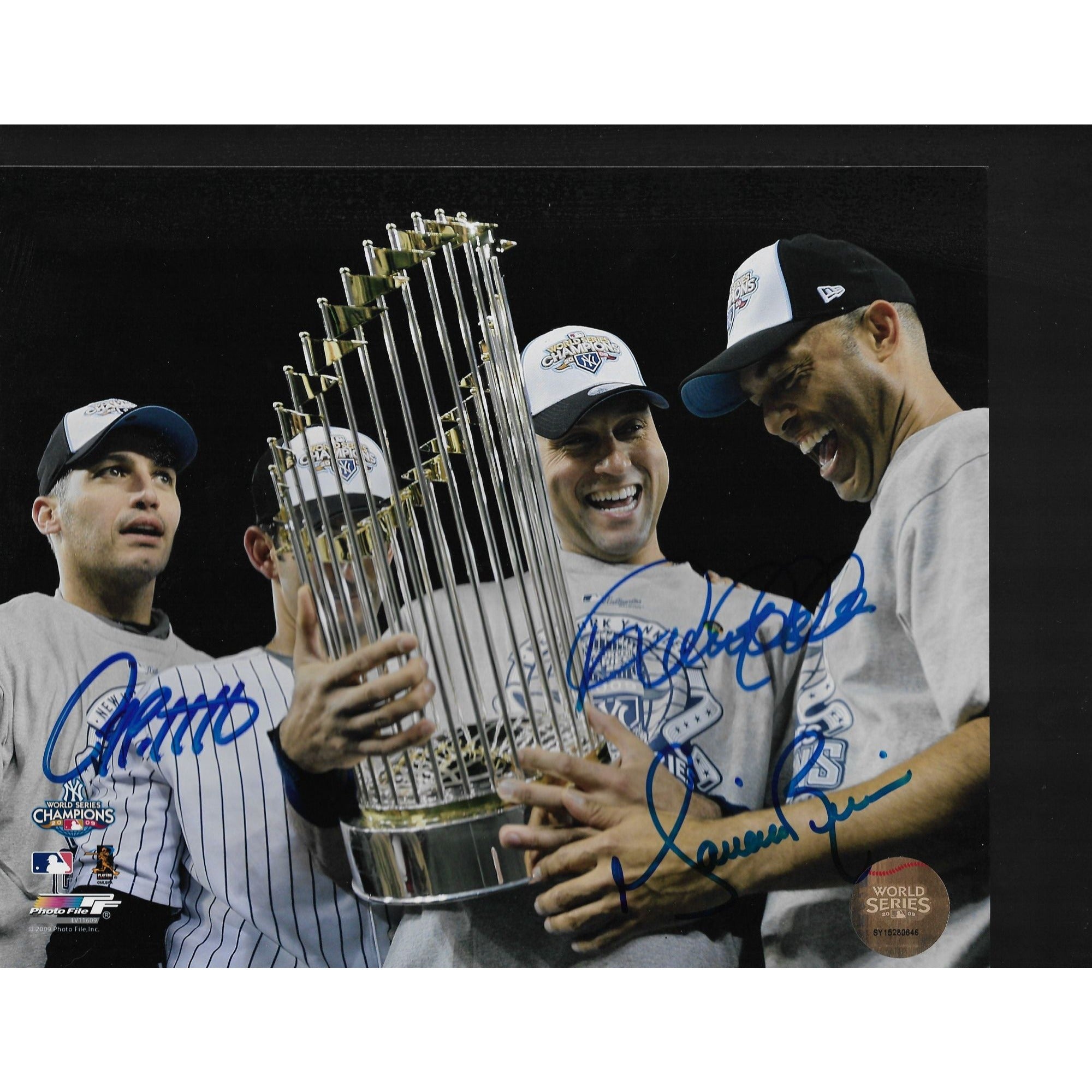 Derek Jeter Mariano Rivera and Andy pettitte. 8 by 10 signed photo