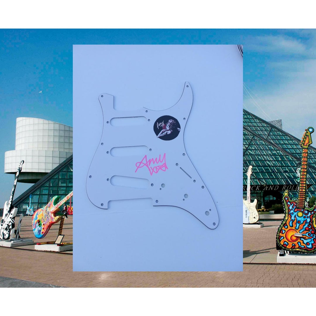 Amy Winehouse electric guitar pickguard signed with proof