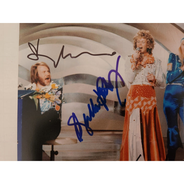 ABBA Anni-Frid Lyngstad Benny Anderson Bjorn Ulvaeus Agnetha Fältskog Zenni 8x10 photograph signed with proof