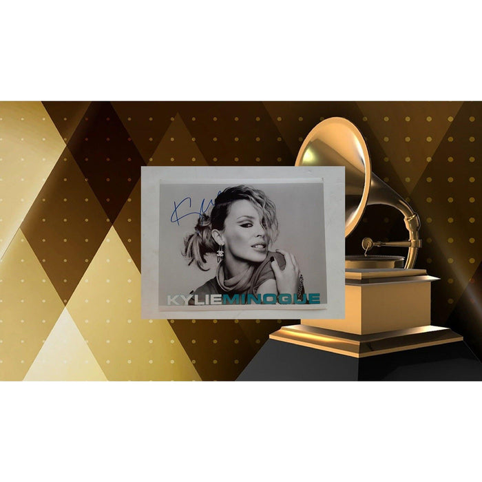 Kylie Minogue 8 by 10 signed photo with proof