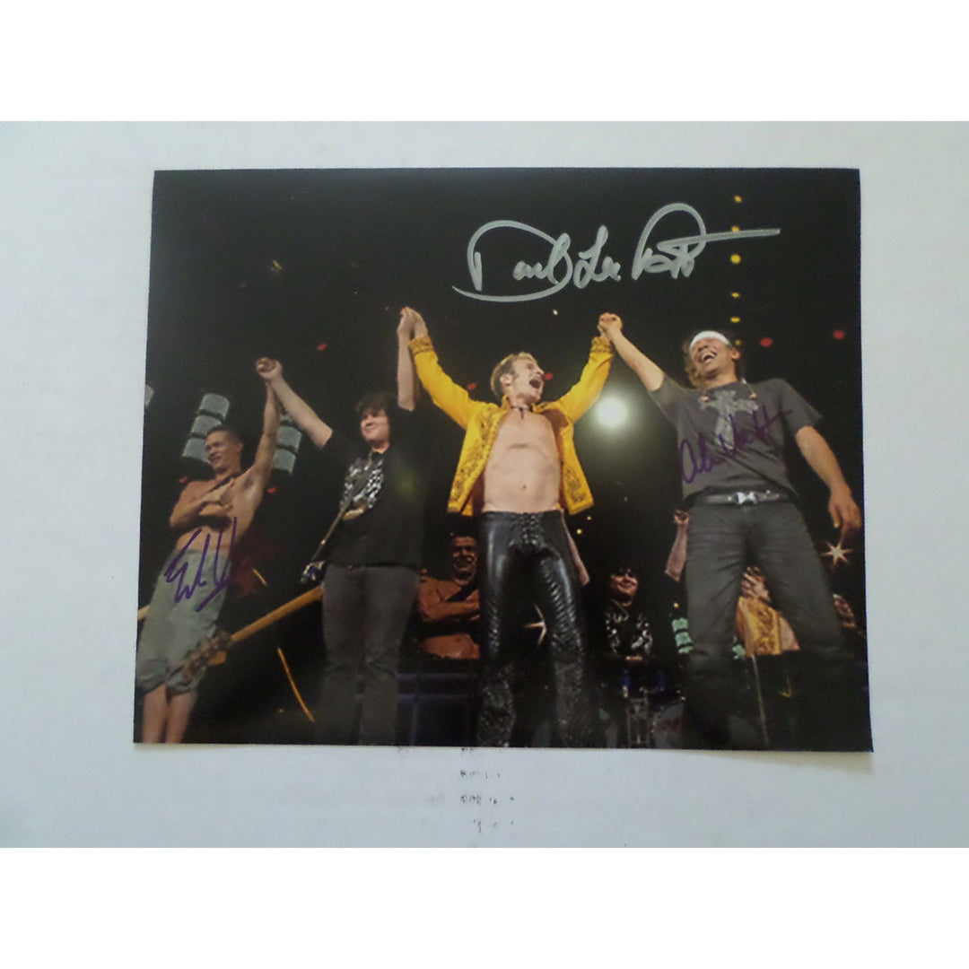 David Lee Roth, Eddie Van Halen, and Alex Van Halen 8 by 10 signed photo with proof