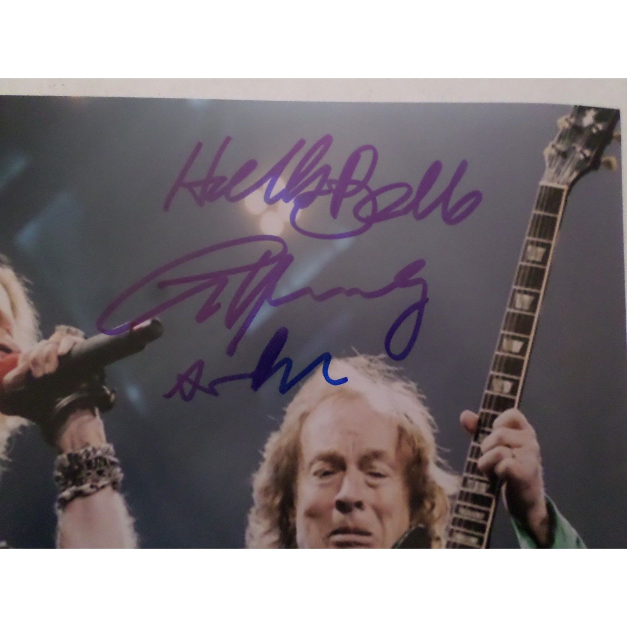 Axl Rose and Angus Young 8 by 10 signed photo with proof