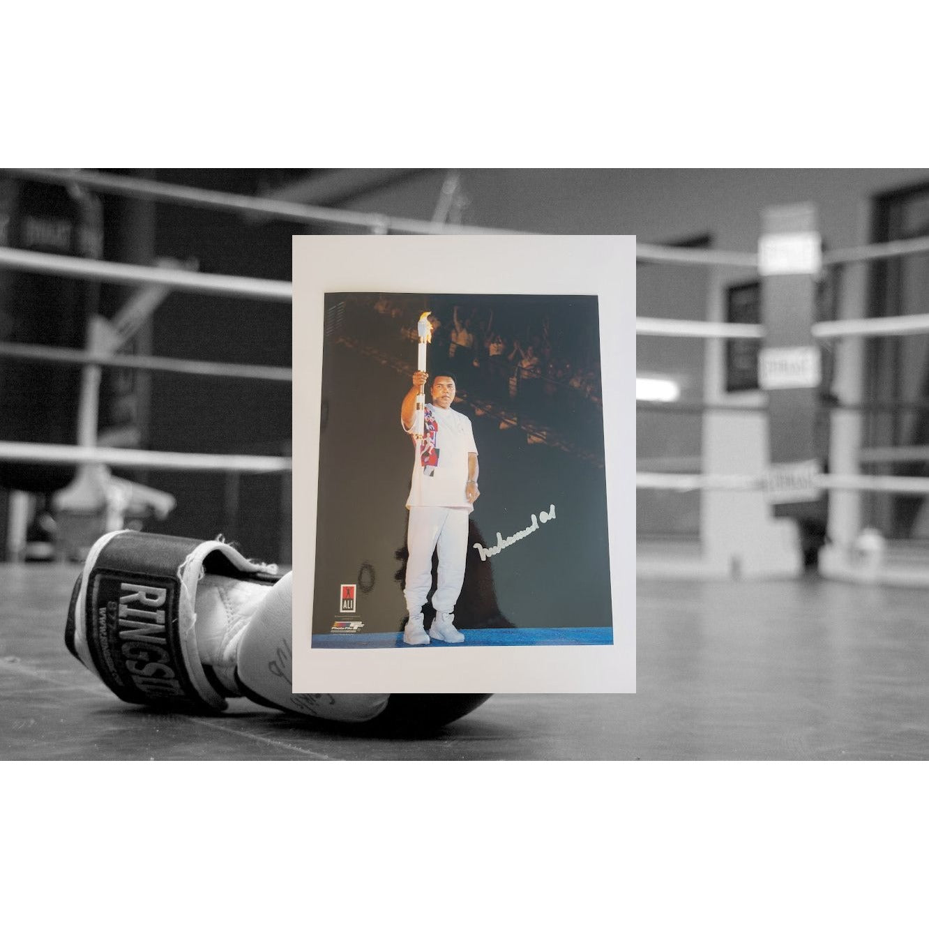 Muhammad Ali holding the Olympic torch 8 x 10 photo signed with proof