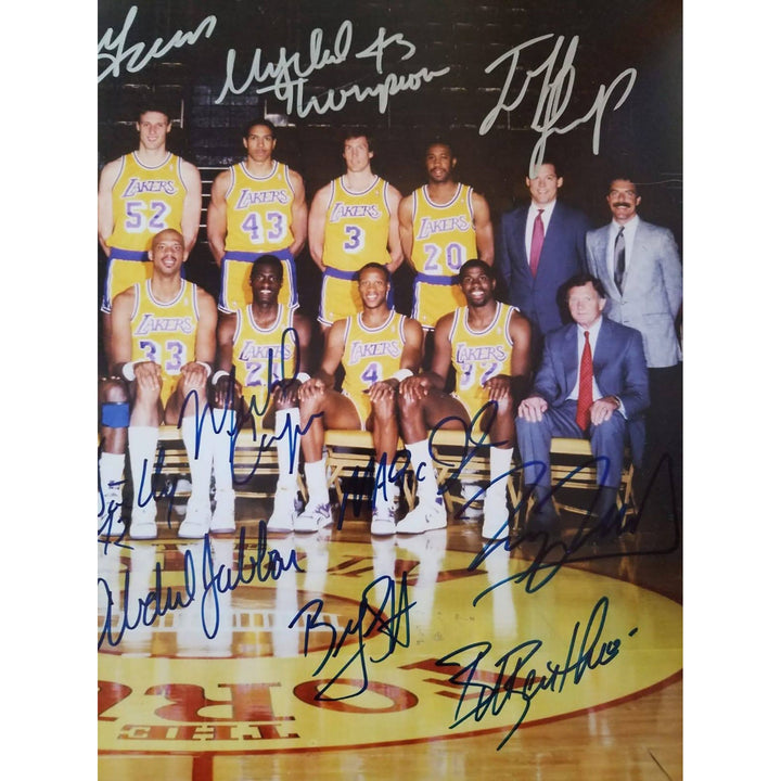 Los Angeles Lakers Earvin Magic Johnson, James Worthy, Jerry Buss team-signed 11 by 14 photo - Awesome Artifacts 