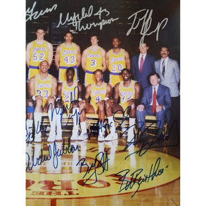 Los Angeles Lakers Earvin Magic Johnson, James Worthy, Jerry Buss team-signed 11 by 14 photo