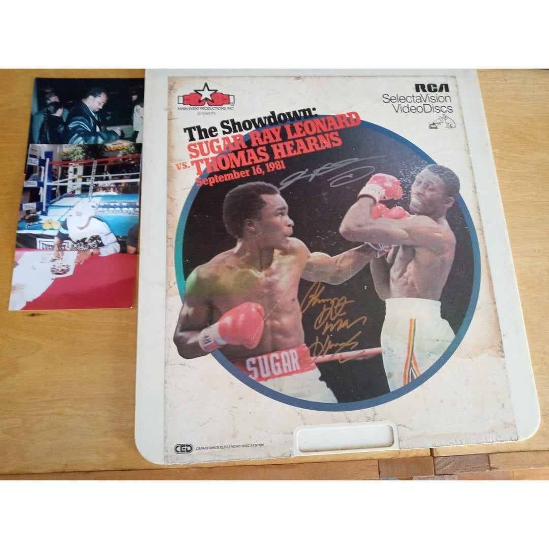 Sugar Ray Leonard and Thomas Hearns RCA video disc signed with proof - Awesome Artifacts 