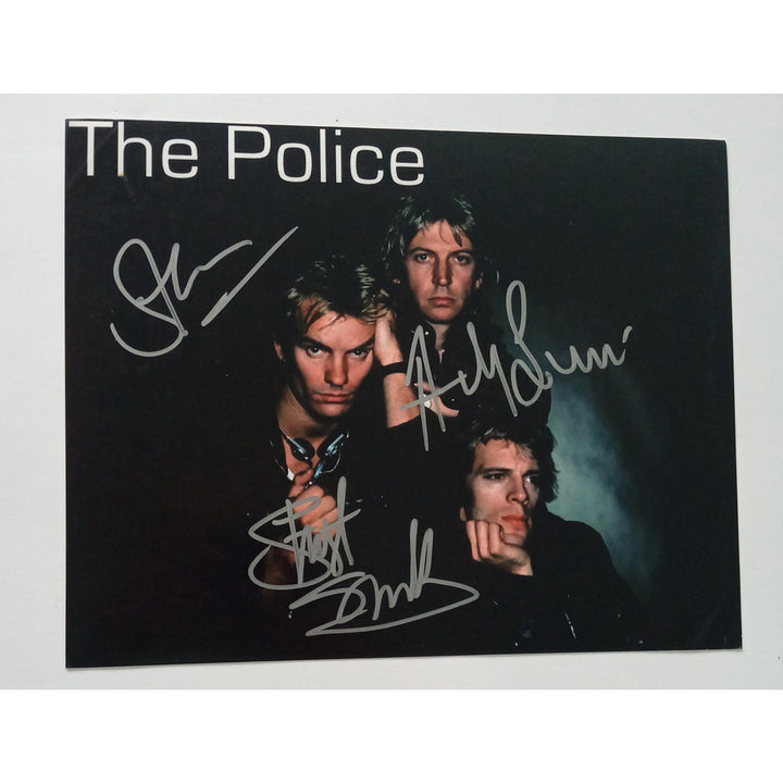 Gordon Sumner "Sting", Andy Summers and Stuart Copeland 8 x 10 signed photo with proof